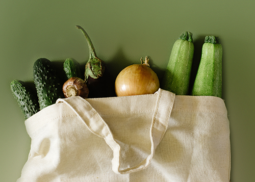 Vegetables in reusable cotton white bag