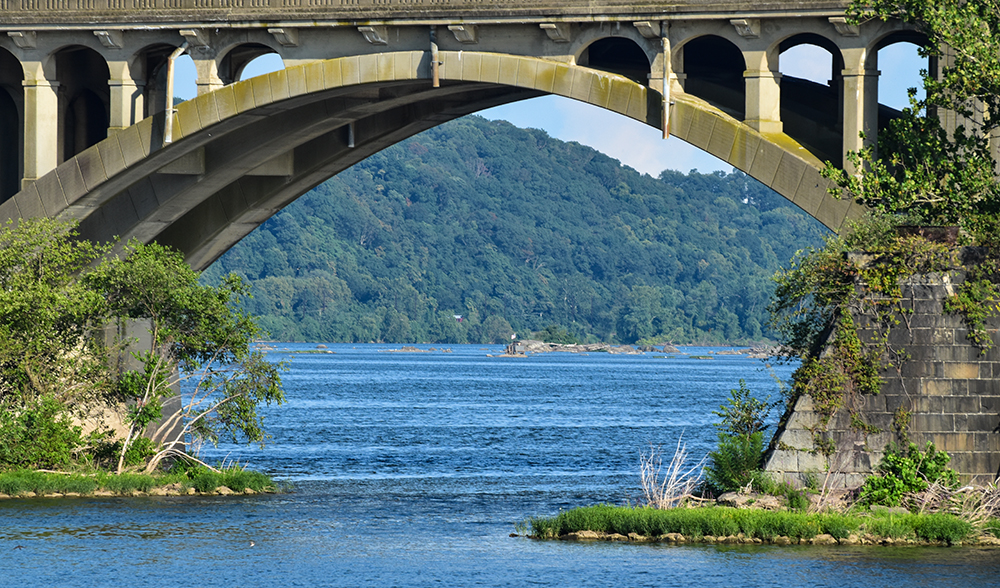 View of Susquehanna River under a bridge