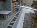 thumbnail of house with start of new foundation