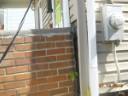 thumbnail of brick cracks and porch pillar pulling away from house