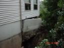 thumbnail of house with foundation collapse